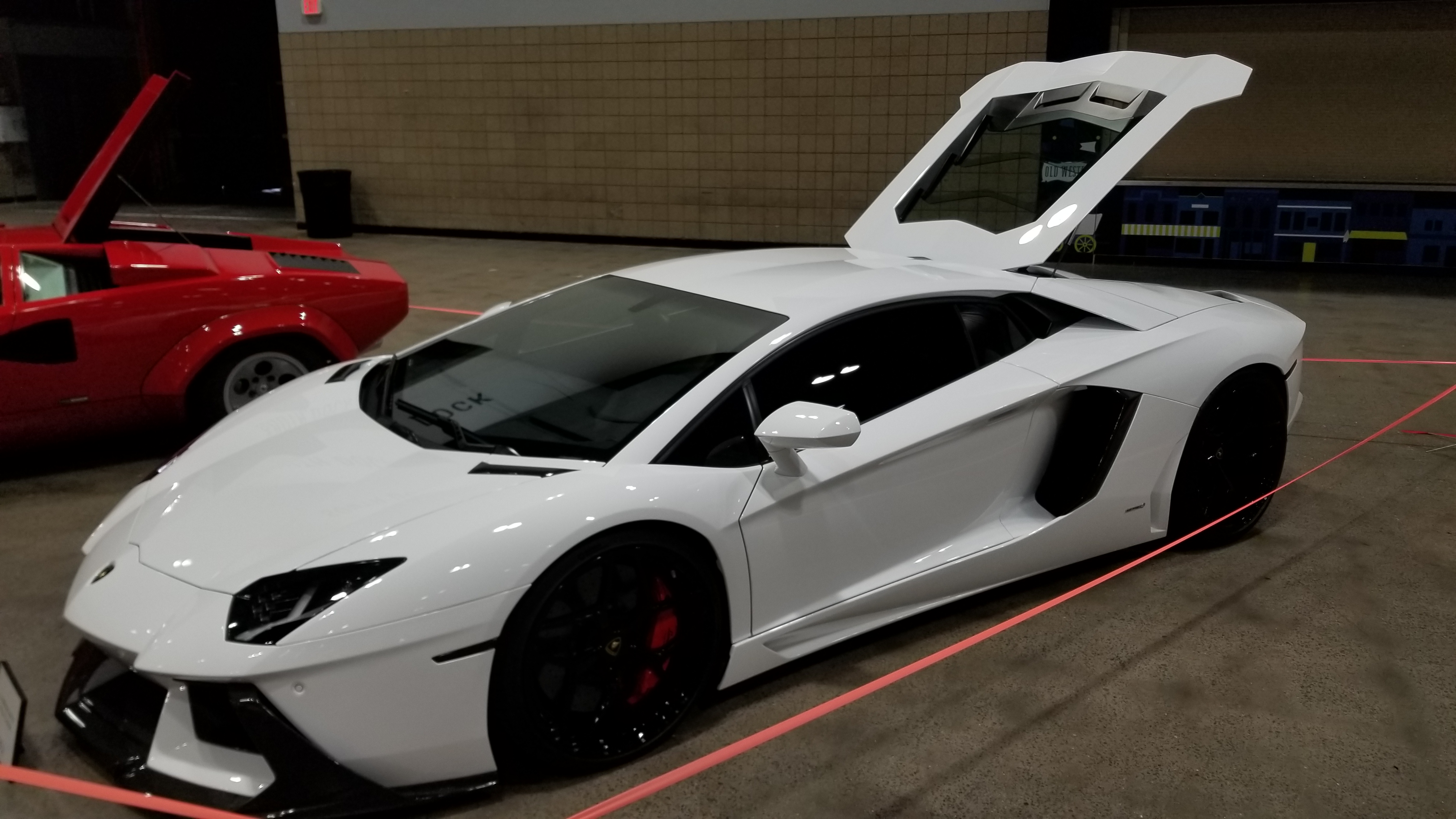 Lamborghini Aventador with hood open at the Kansas City Auto Show